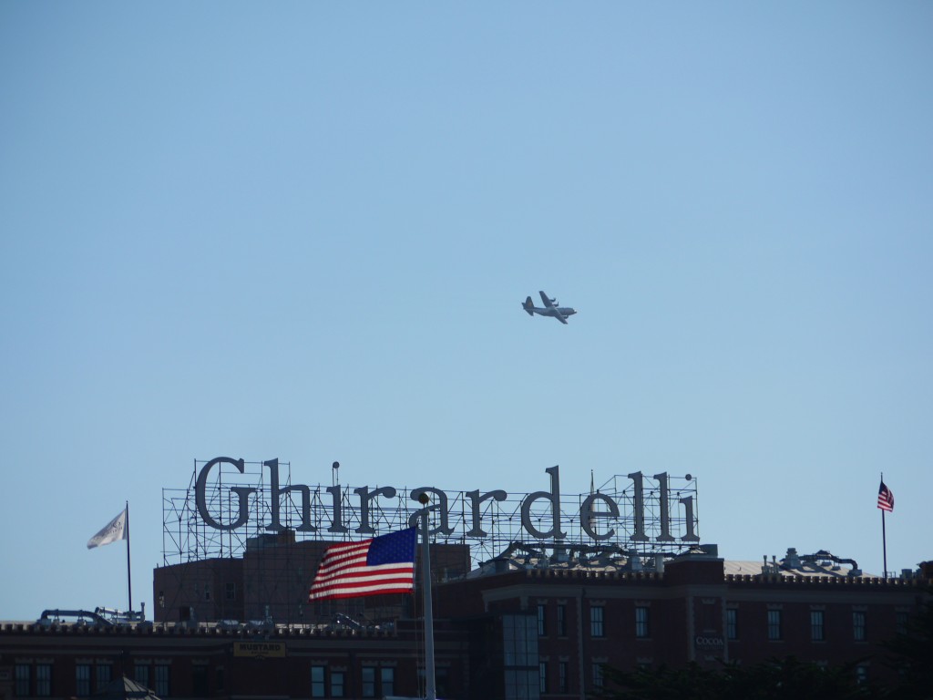 US Marines Lockheed-Martin C-130T Hercules flying past Ghirardelli's